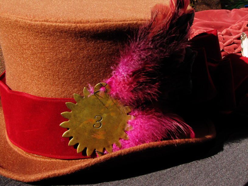 Hat with plume.
