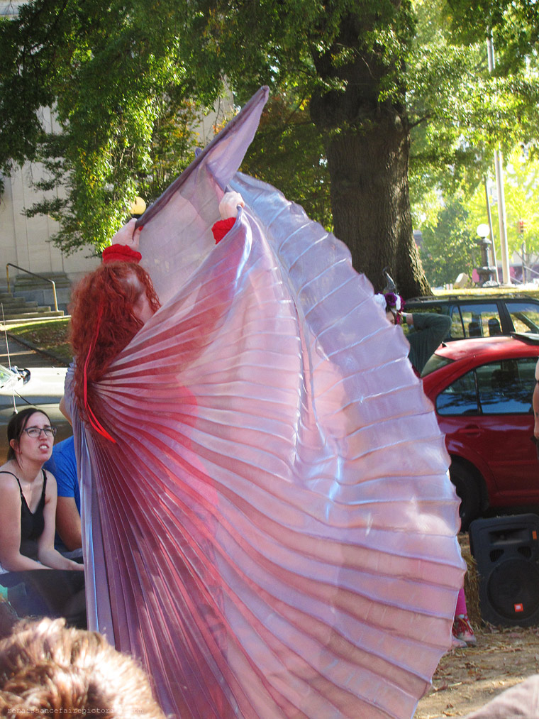 Dancer with semi trasparetn dance wings.