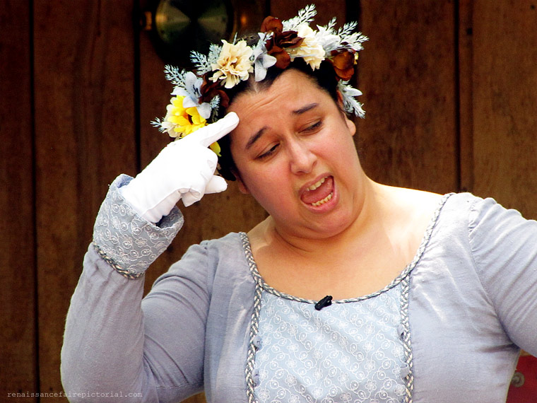 Maid marian wearing a flower crown.