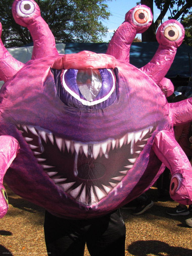 person in an inflatable beholder suit. It's a ball with one eye huge mouth and tentacles.