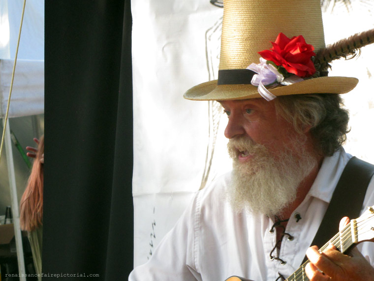 John in tall  hat