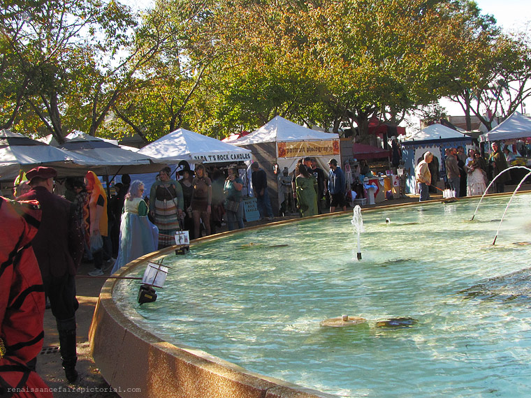 people sailing boats in a foutain..