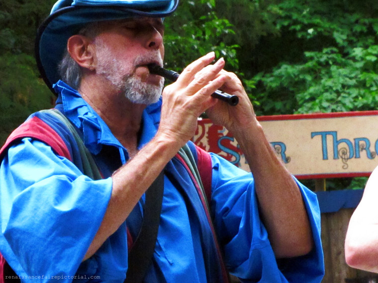 man playing flute