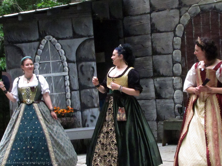 Three womwn in noble dresses