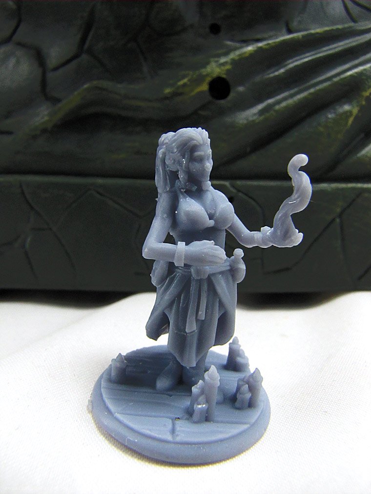 3d printed figure with fire in her hand. 