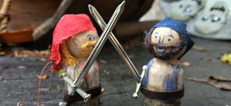 wooden toys of pirtaes fighting.