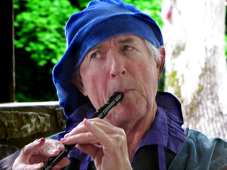 man playing flute