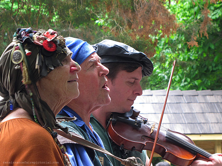 three people playing music