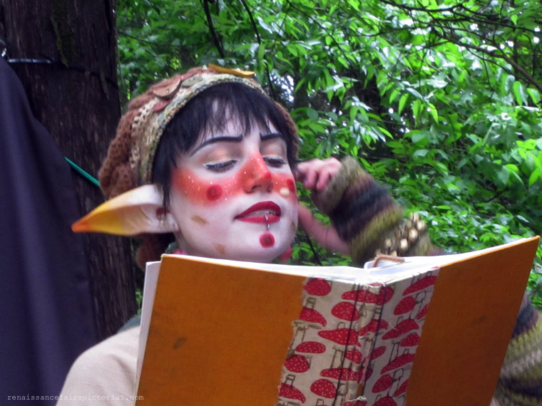 fae folk reading a story.