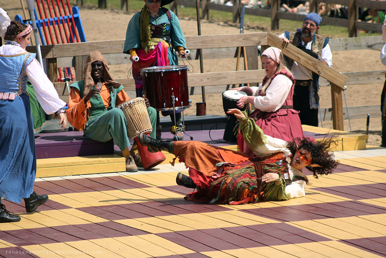 Human Chessmatch. two people fighting, Fairy is landing on board after a tumble.