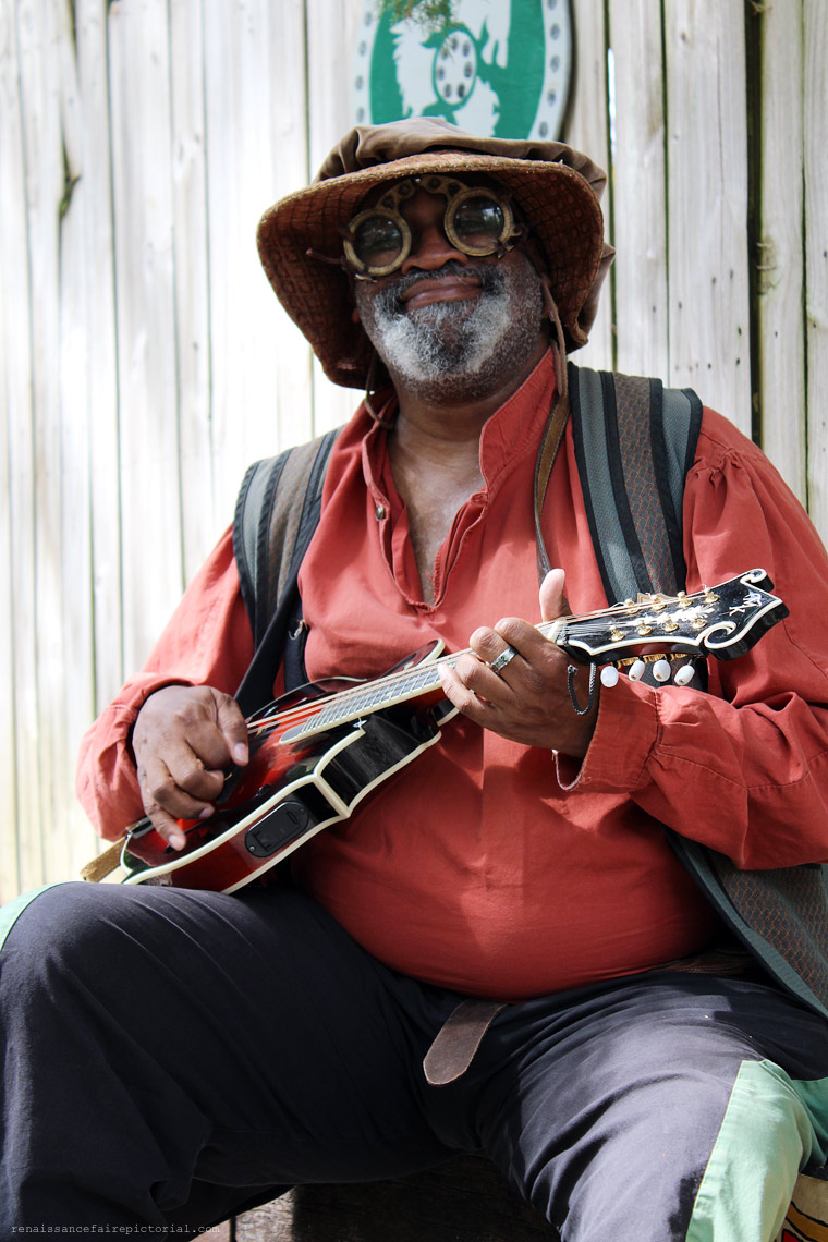 Black Man playing guitar